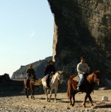 Cabalgando en la playa 