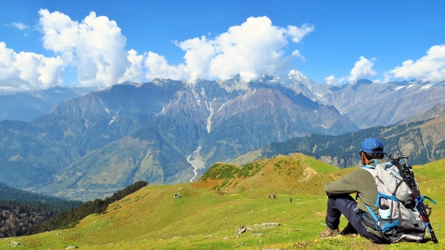  Arrived at the top, he rests for the descent 