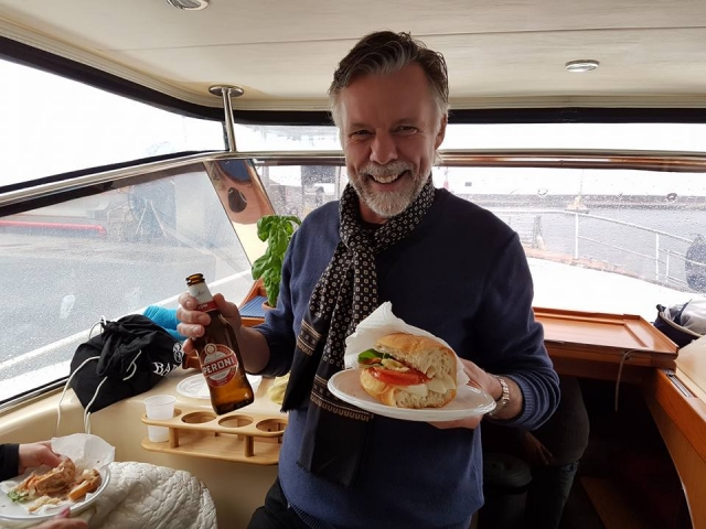  With a sandwich and a nice beer 