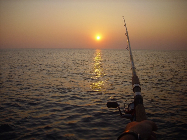  Sport fishing during a breathtaking sunrise 