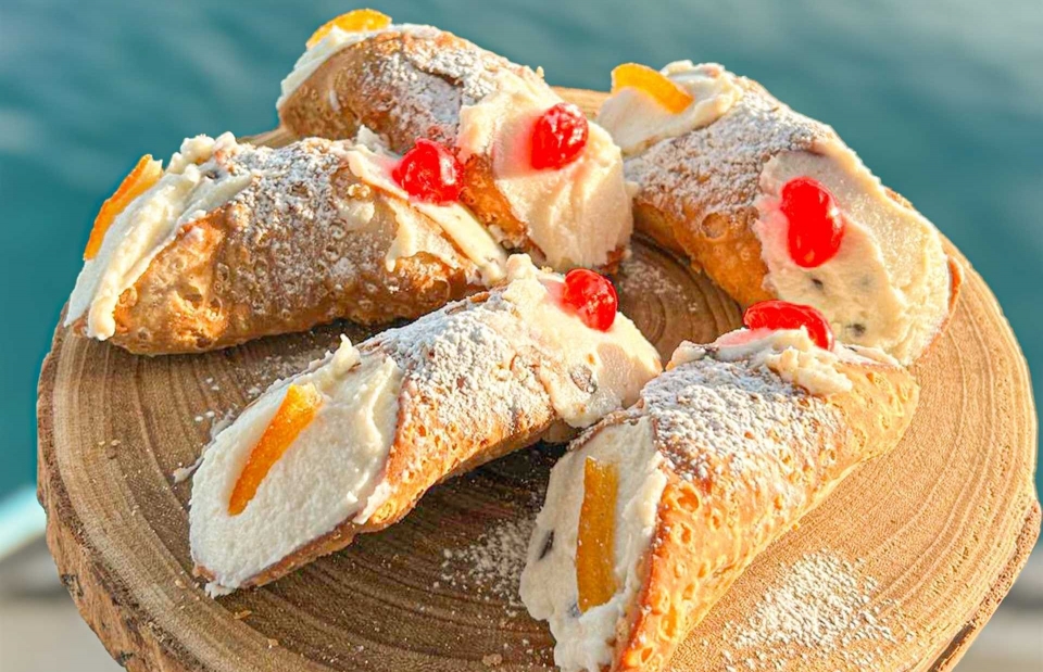 Taste Sicilian cannoli on board 