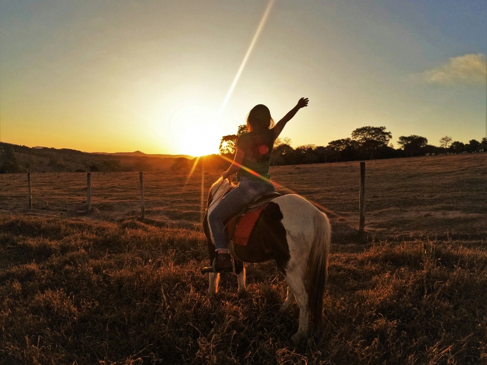  Horseback riding at sunset
