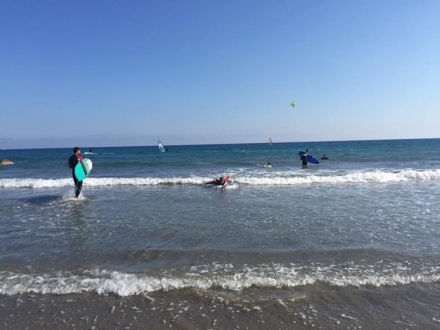  Surfers in the Ligurian Sea 