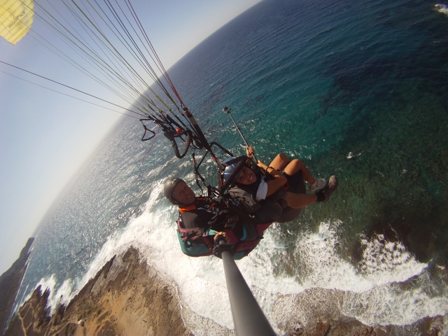  Flying over the sea in a paraglider