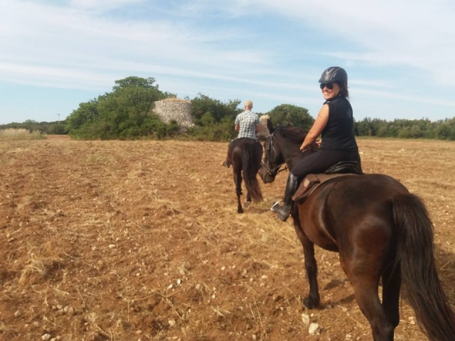 On horseback in the nature of Lecce 