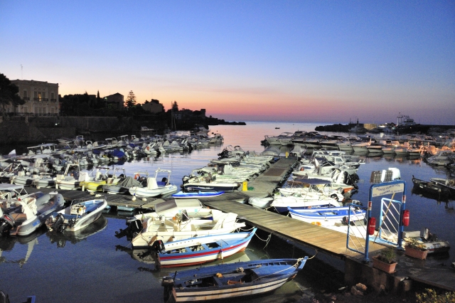 The port of Ognina at sunset 