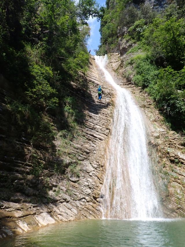  Descending alongside a natural waterfall 