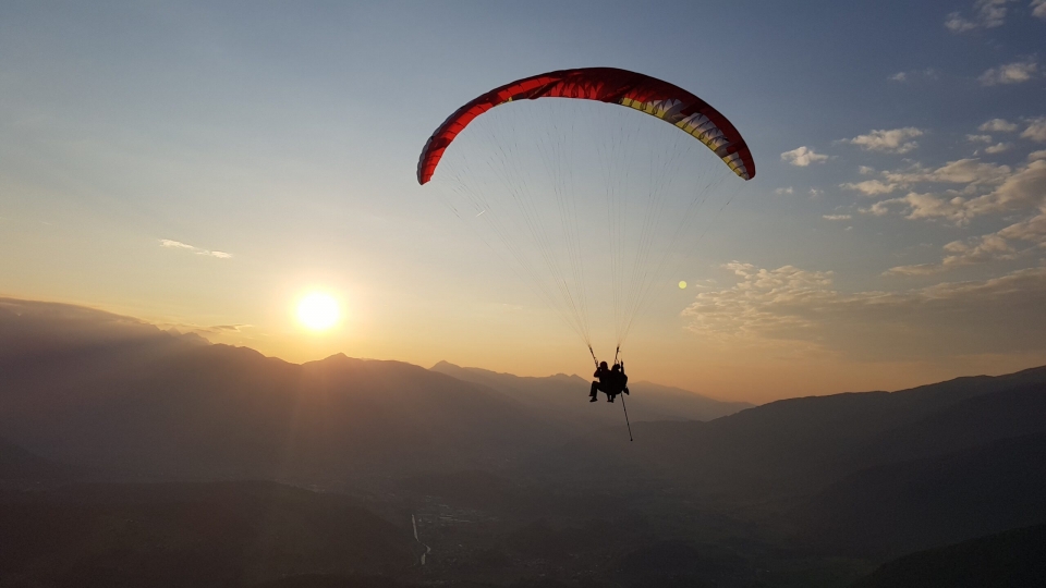 paragliding at sunset 