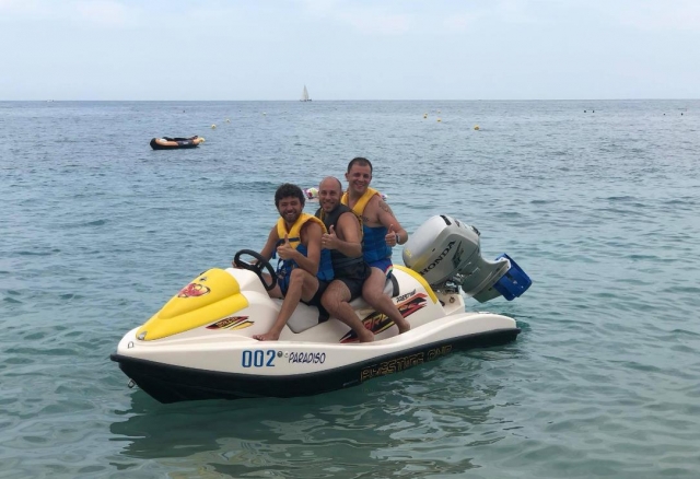  on a jet ski with friends 