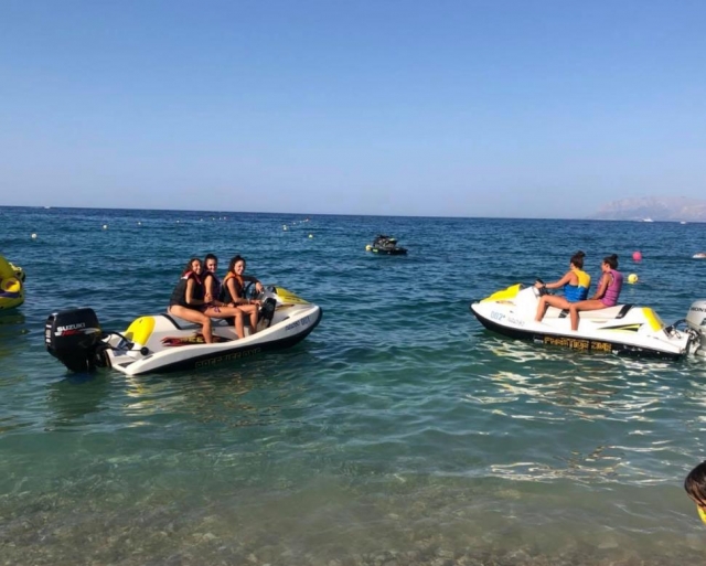  on a jet ski with friends 