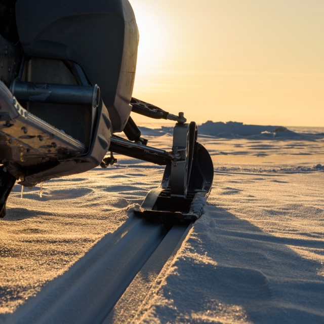 By snowmobile from Grostè for a dinner in a mountain hut