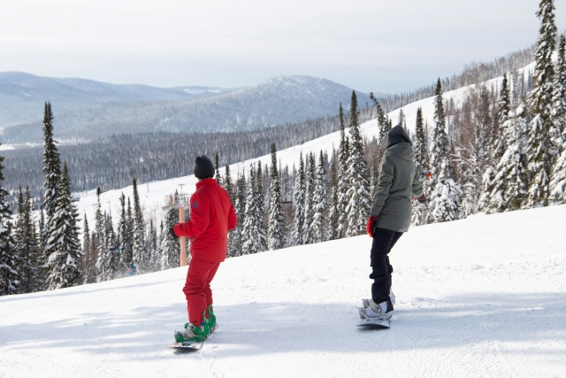 Snowboarding amidst the snowy landscapes
