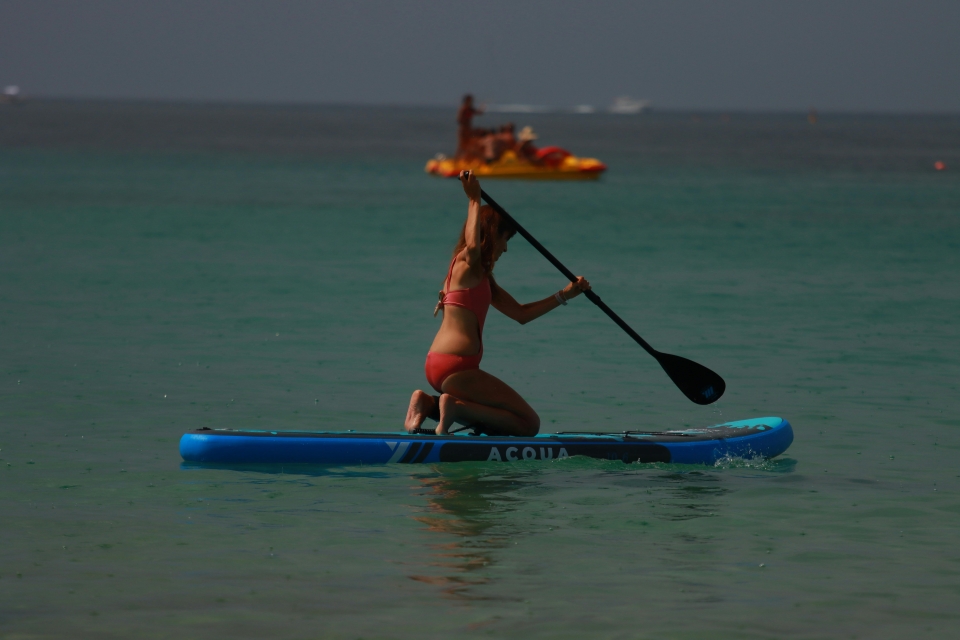 Praticar paddle surf 