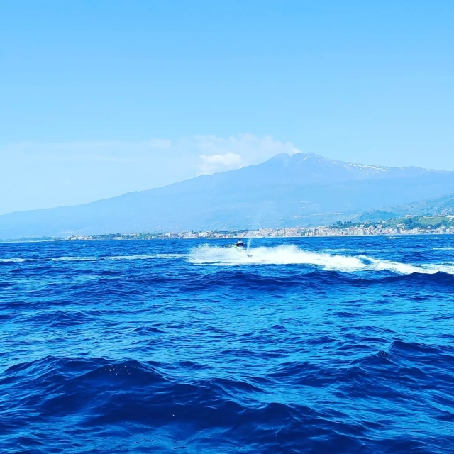  jetski with Etna as a backdrop 