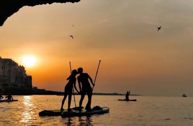 in sup al tramonto