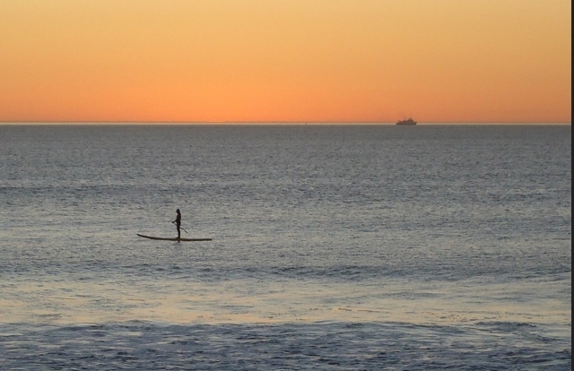 in sup al tramonto