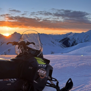 Orobie Alps sunset snowmobile tour + 90' aperitif